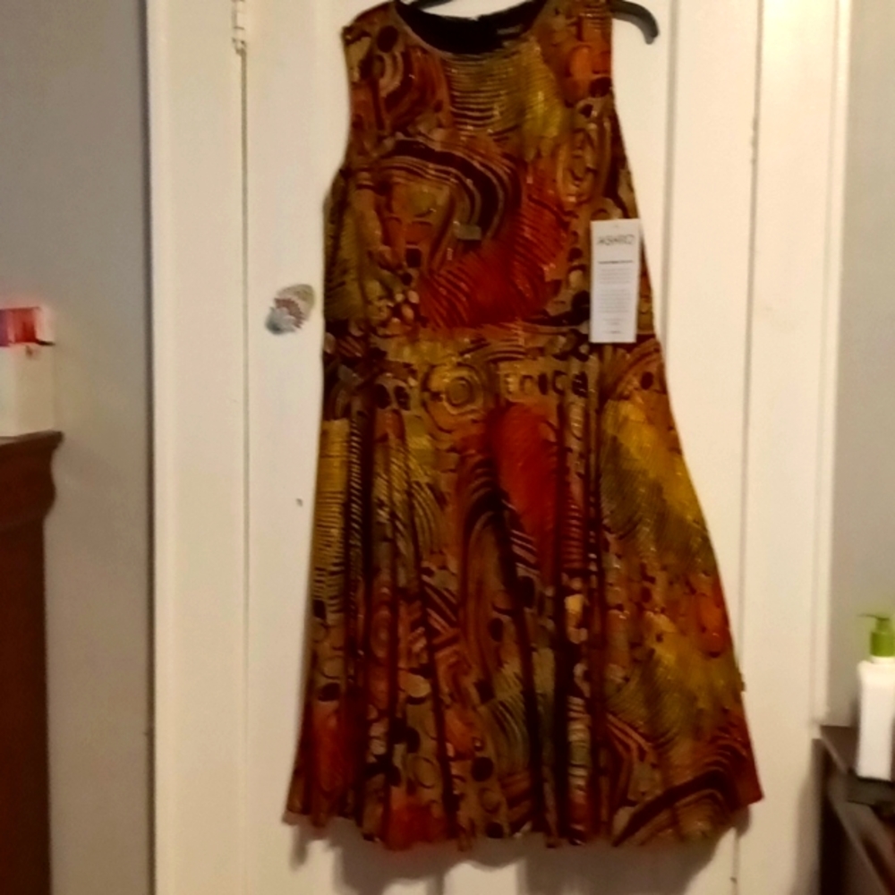 Multi color dress size 16w sold by Astro, fall colors, orange, black and green,
